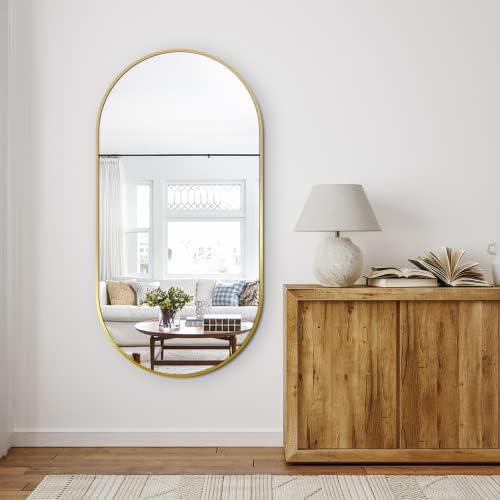 Delma 48x24 Gold Oval Bathroom Mirror by Delma