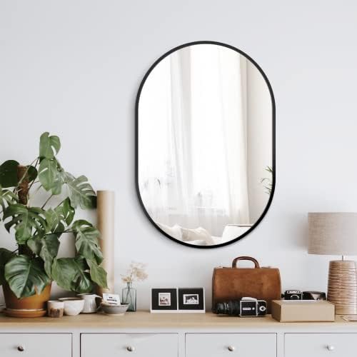Delma 30x20 Black Oval Bathroom Mirror by Delma